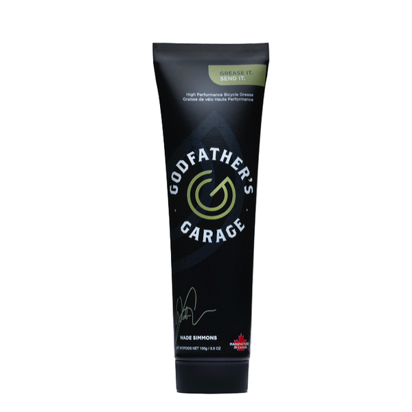 Black tube of 'Godfather's Garage' product on a white background