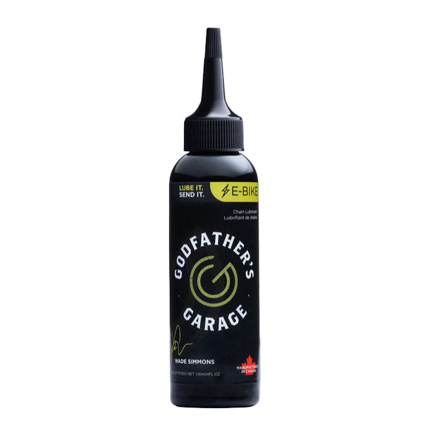 Bottle of Godfather's Garage e-bike chain lube on a white background