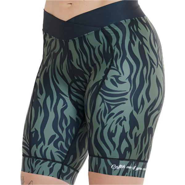 Green and black patterned shorts on a plain background
